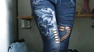 Horny Girl strips jeans and fingers herself.